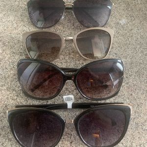 Women’s sunglasses set of 4 unworn in great condition